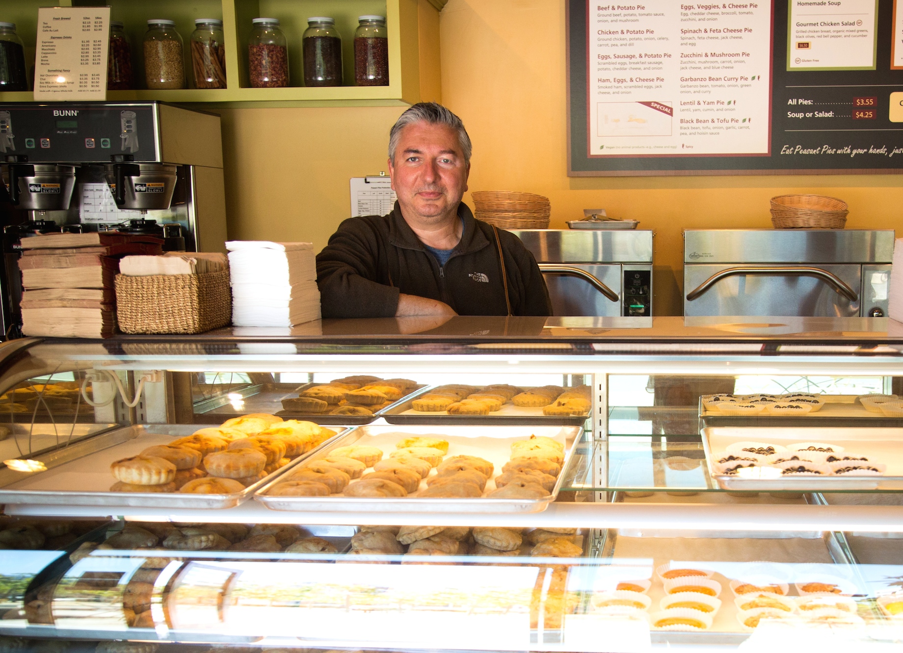 Peasant Pies owner Ali Keshavarz behind the counter.
