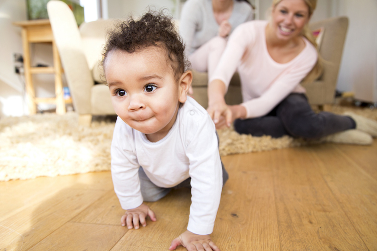crawling baby exploring room