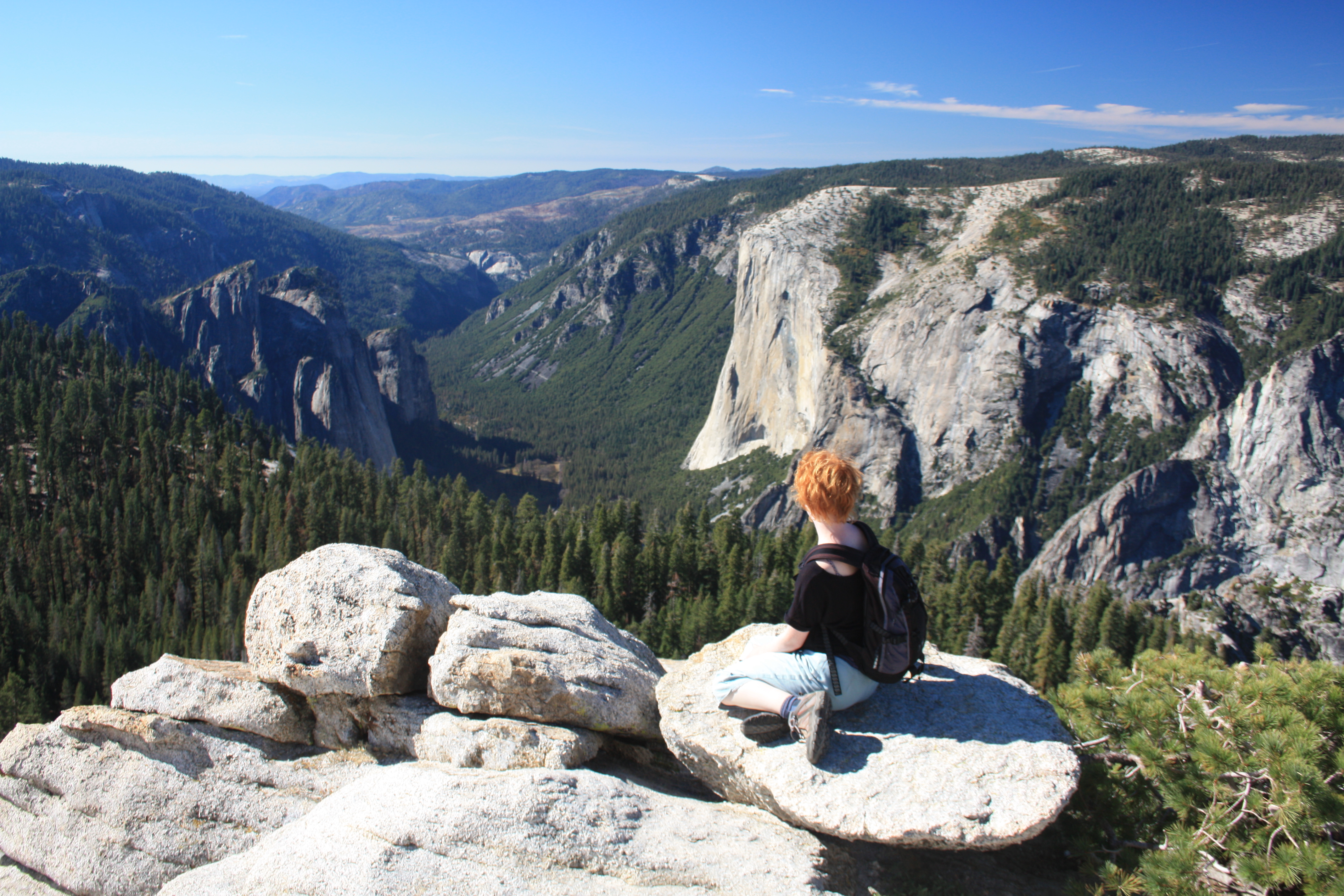 Louise sitting on a rock overlooking the sentinel horizon
