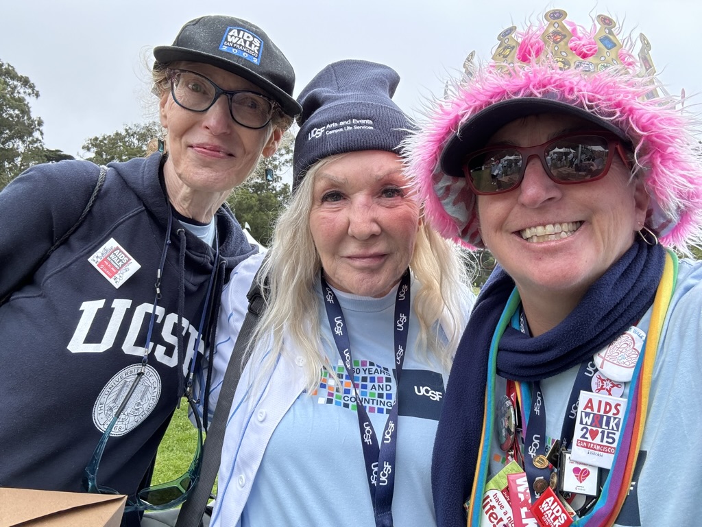 Hallacy poses with colleagues at the AIDS Walk