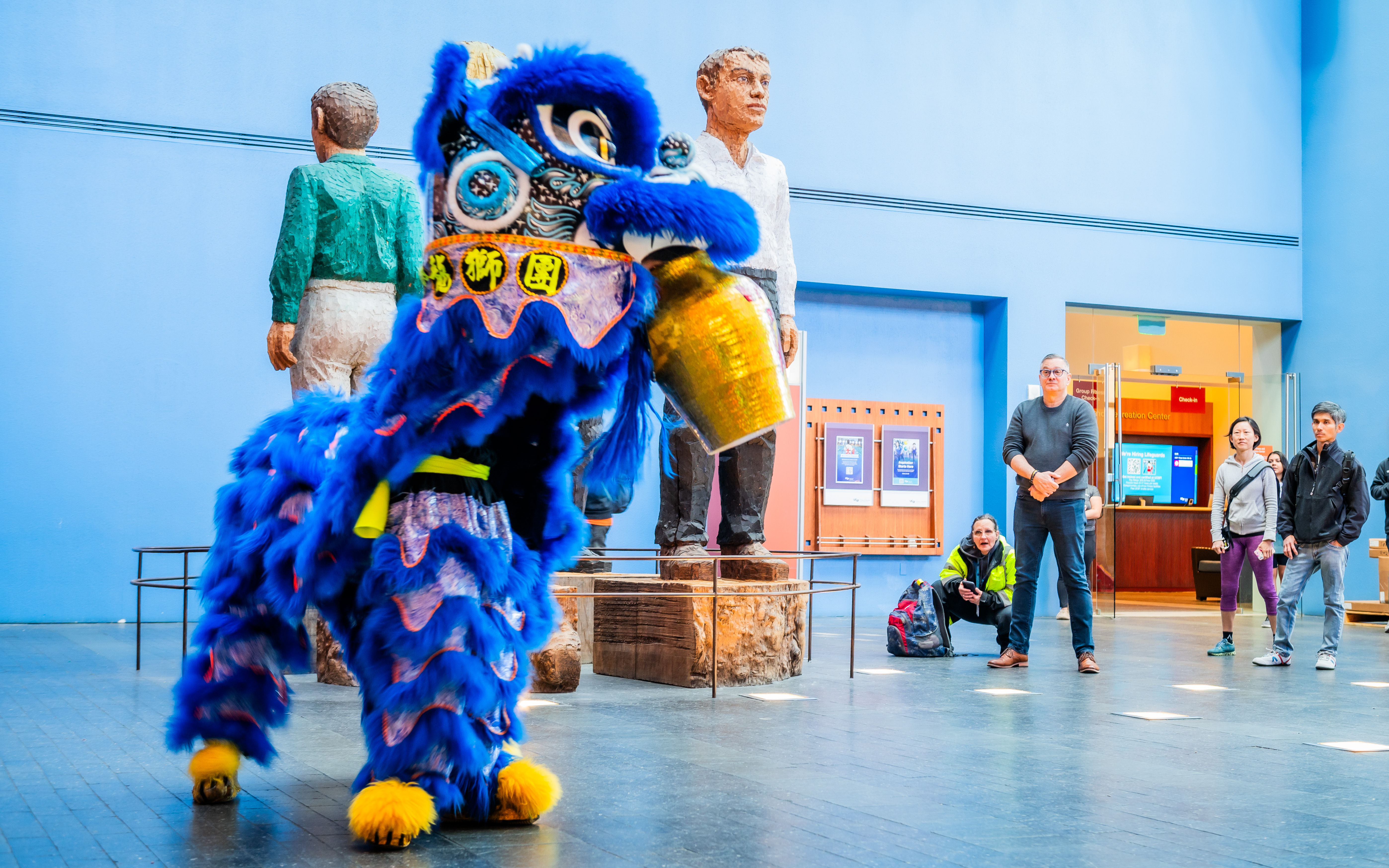 Lion dancer with jug 