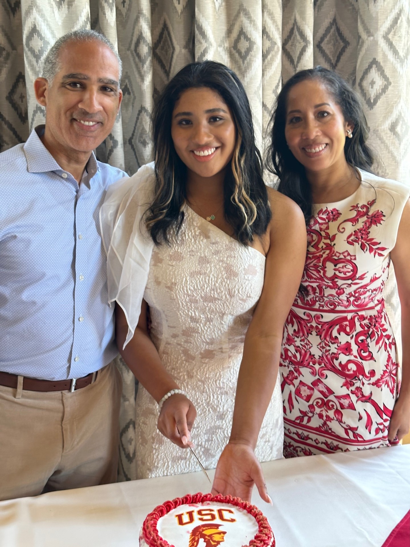 Joanna with her daughter and husband