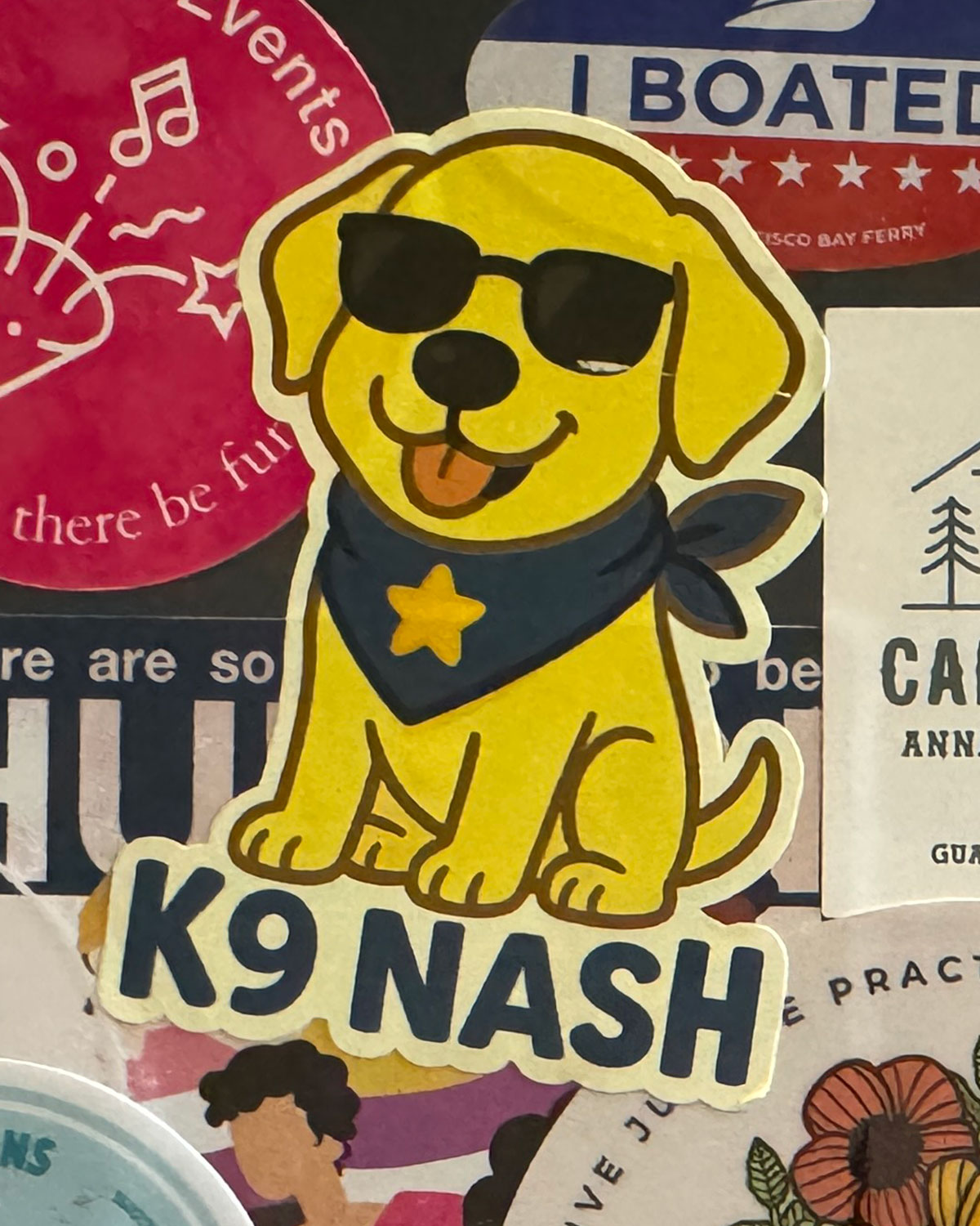 Sticker of an illustrated dog with "K9 Nash" 