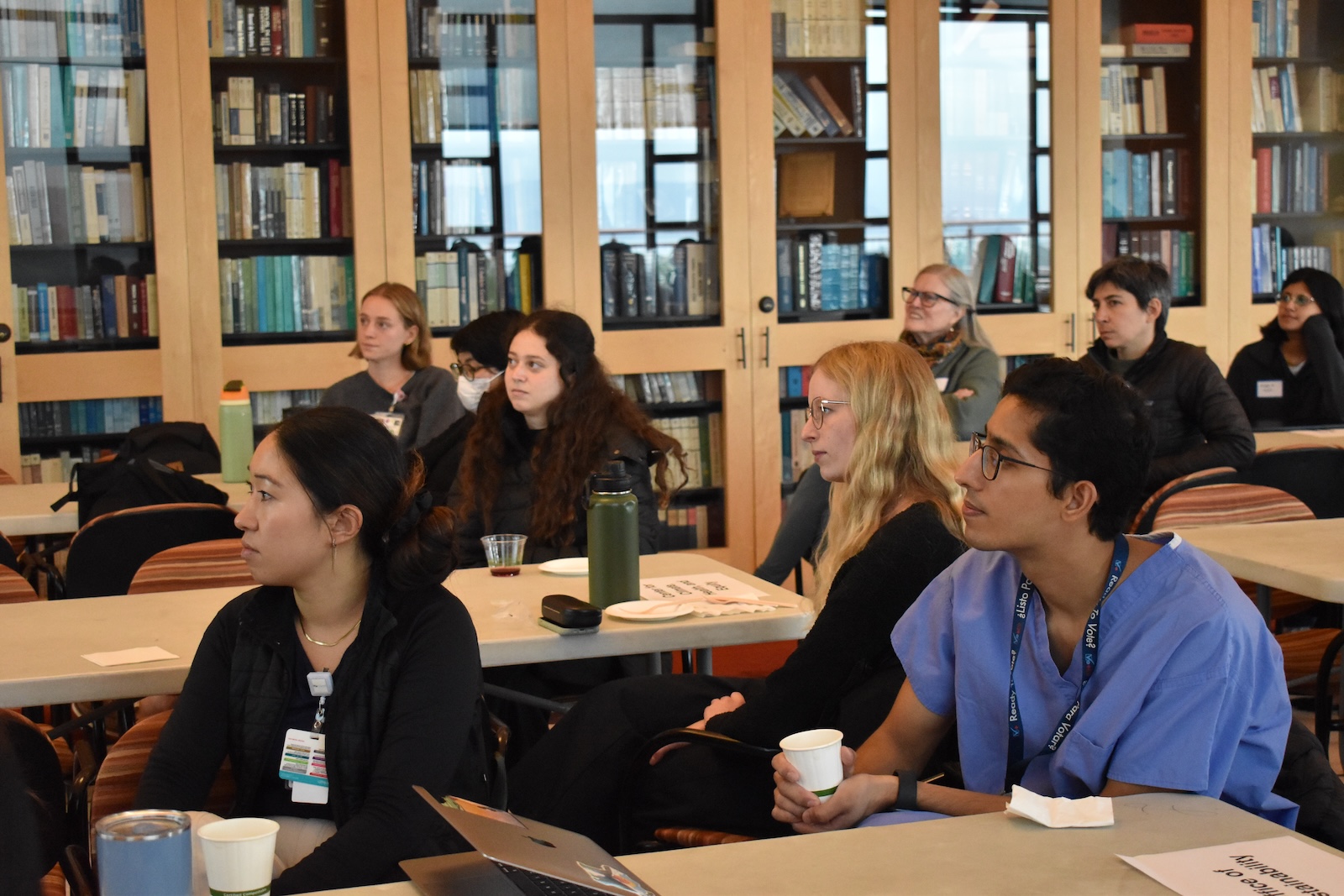 attendees listening closely during talk