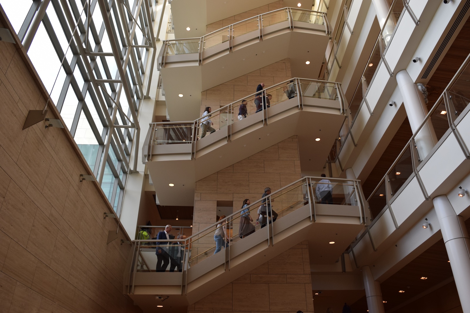 Chau leads tour participants through Genentech Hall