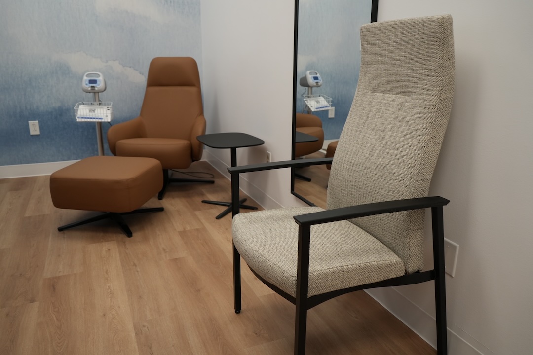 Two chairs inside lactation room.