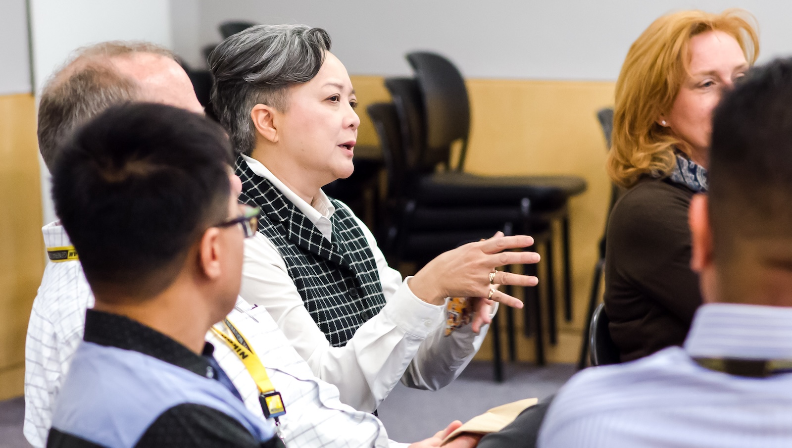 Monica sharing in a group conversation