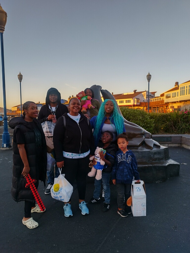 Fredrieka Michael posing with her family dressed up in costumes