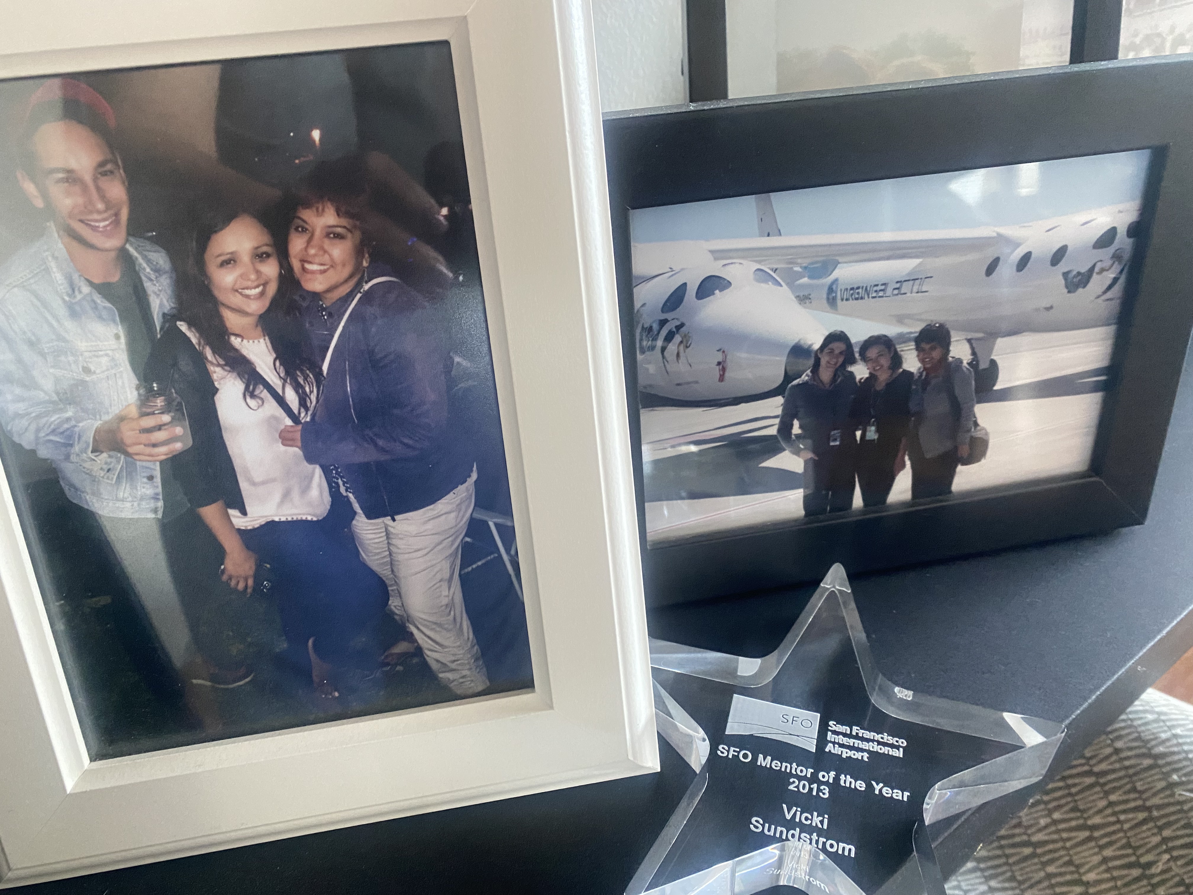 Frames of friends posing in front of aircraft next to a star shaped award that reads 'SFO Mentor of the Year'