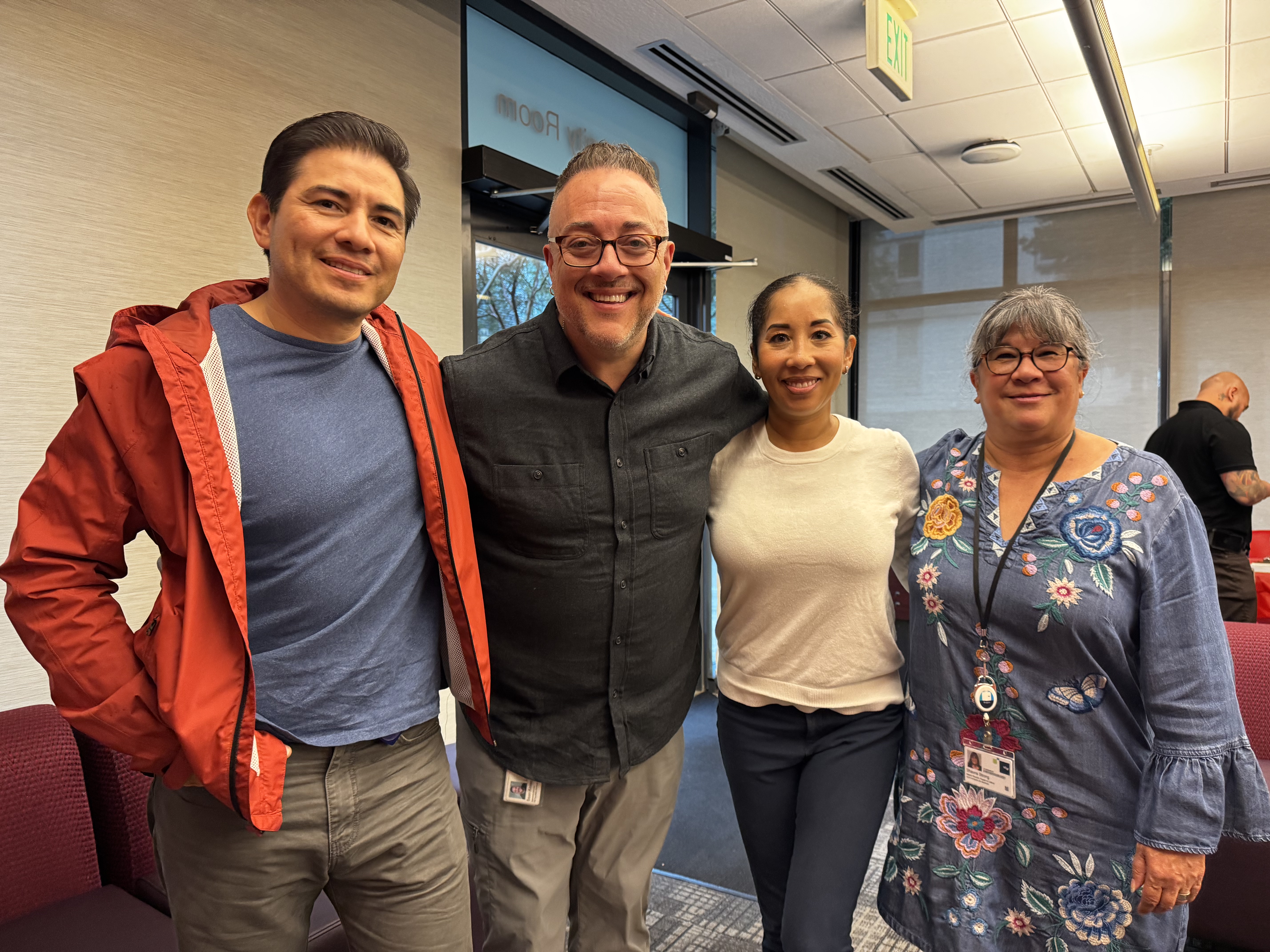 Team members pose at Grubsgiving