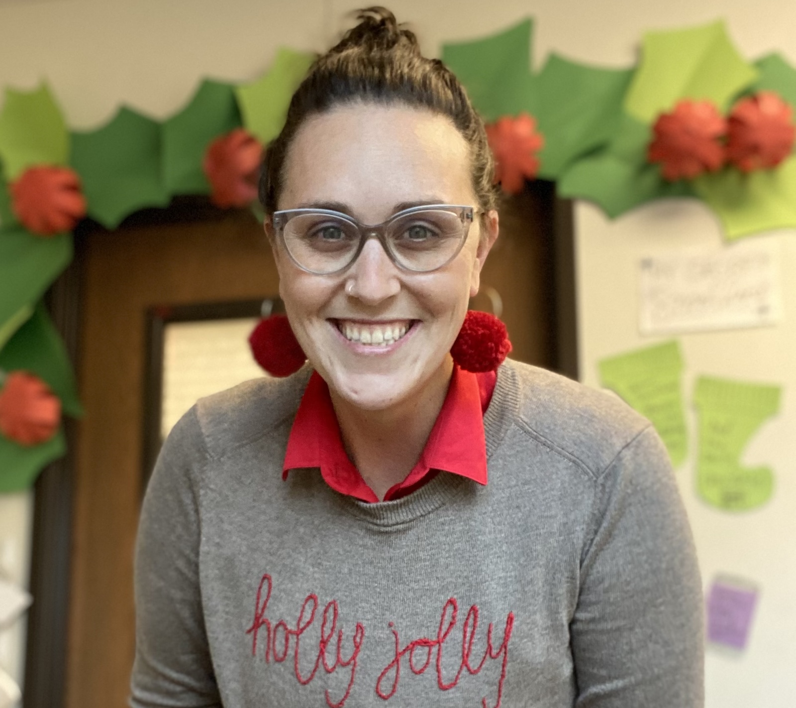 Fazio models pom pom earrings she crafted