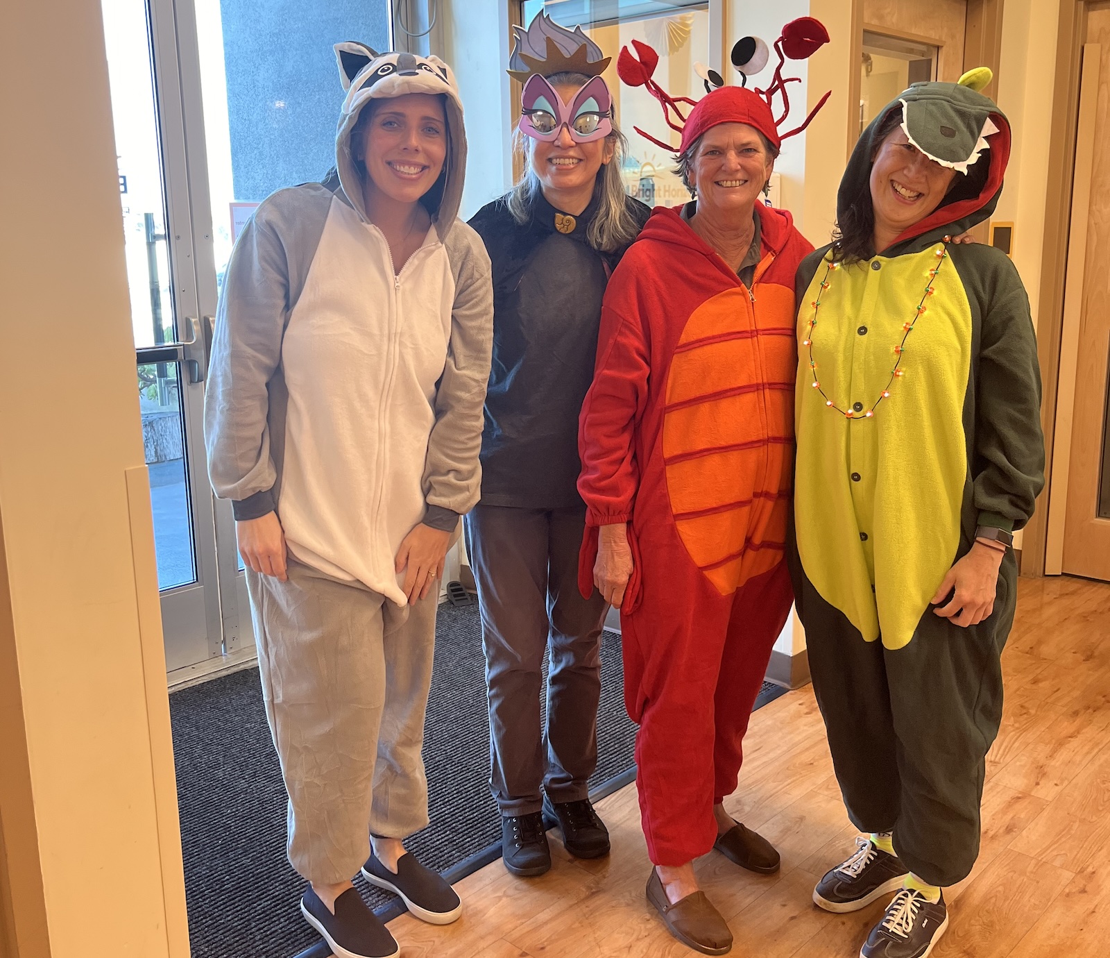 Photo shows Laurel Heights Center Director Kristina Langner, Child Care Referral Services Coordinator, Pauline Lee, Family Services Director, Nathalie Larsen, Family Services Executive Director of Programs- AVC, Pam Su