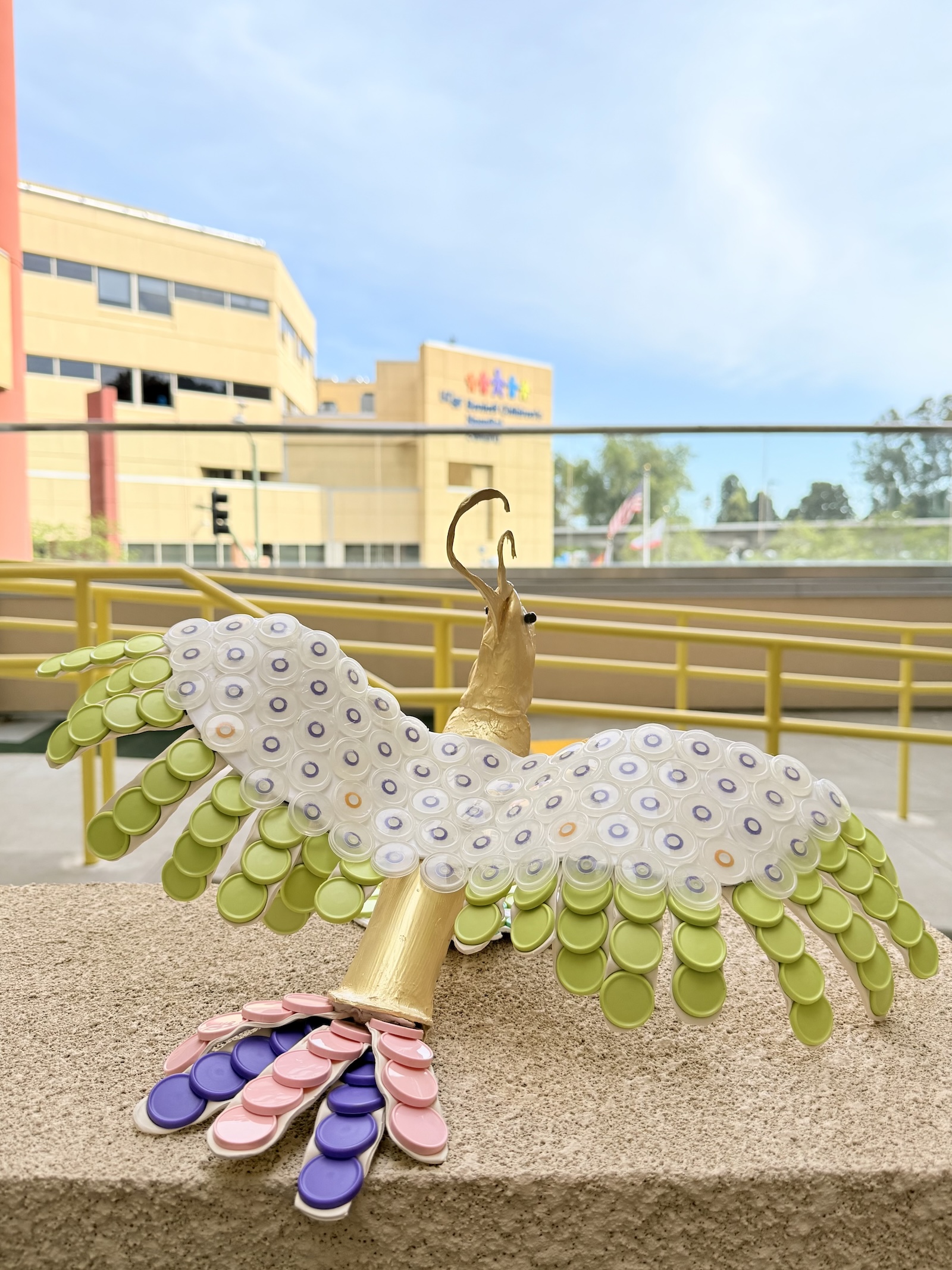 A bird made of recycled materials