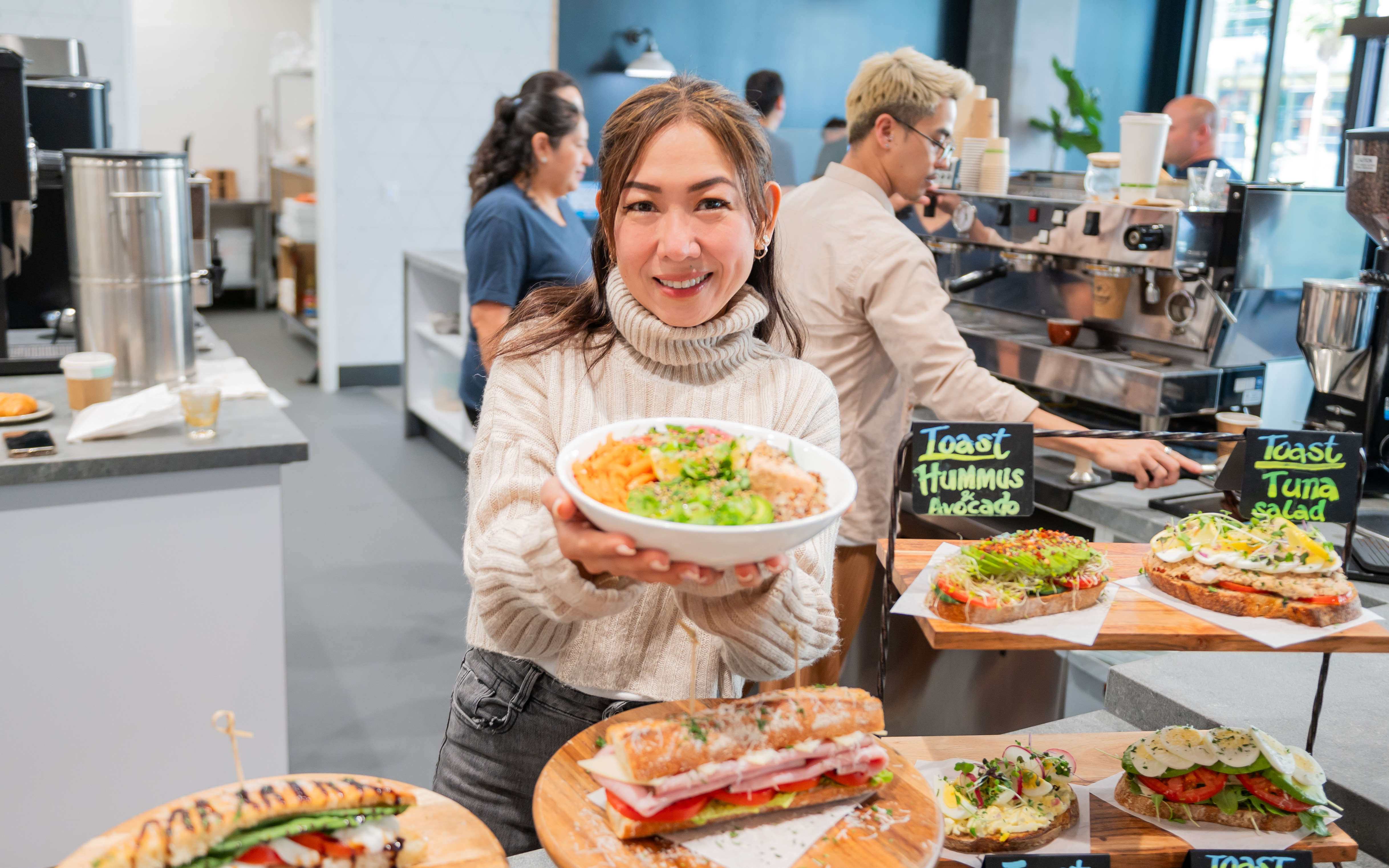Person holding a salad bowl
