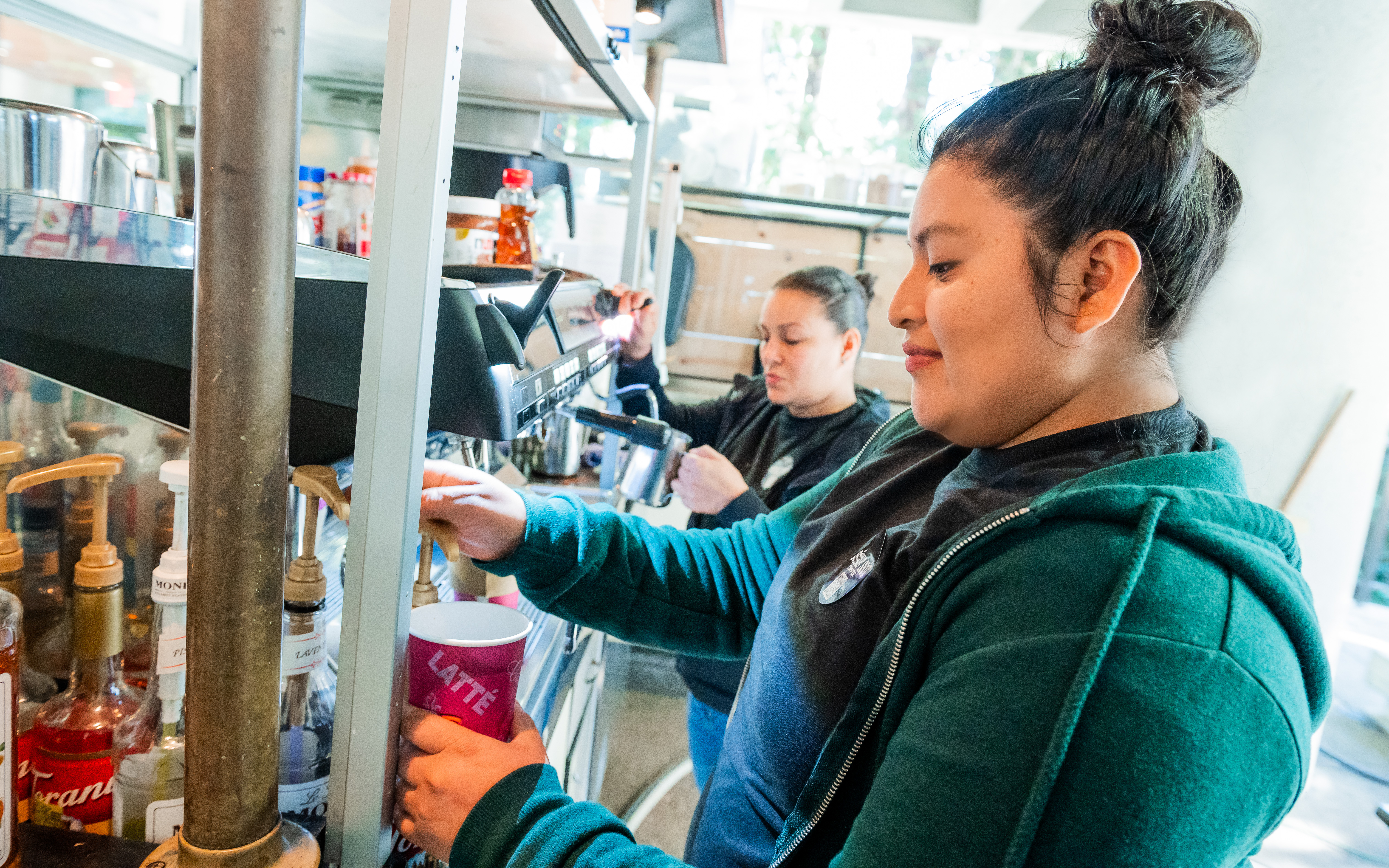 barista making coffee