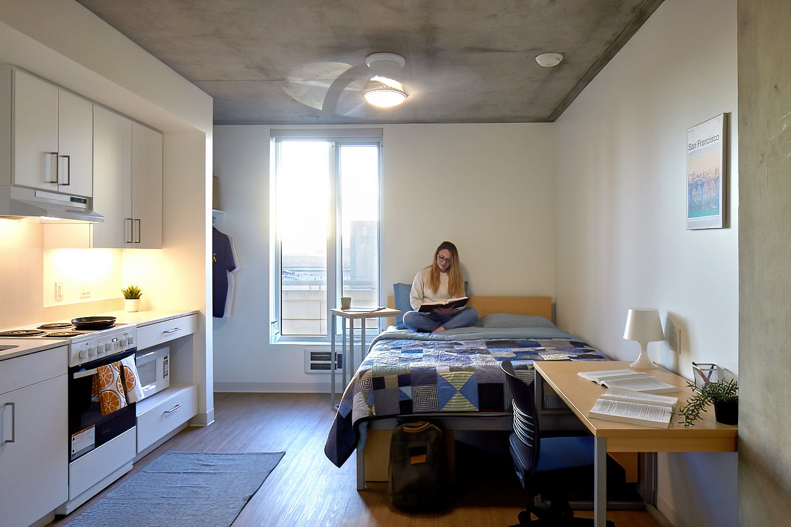 person sitting on the bed.