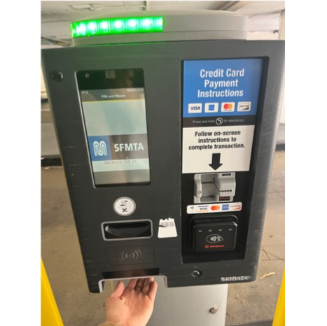 Parking garage scanner with hand underneath