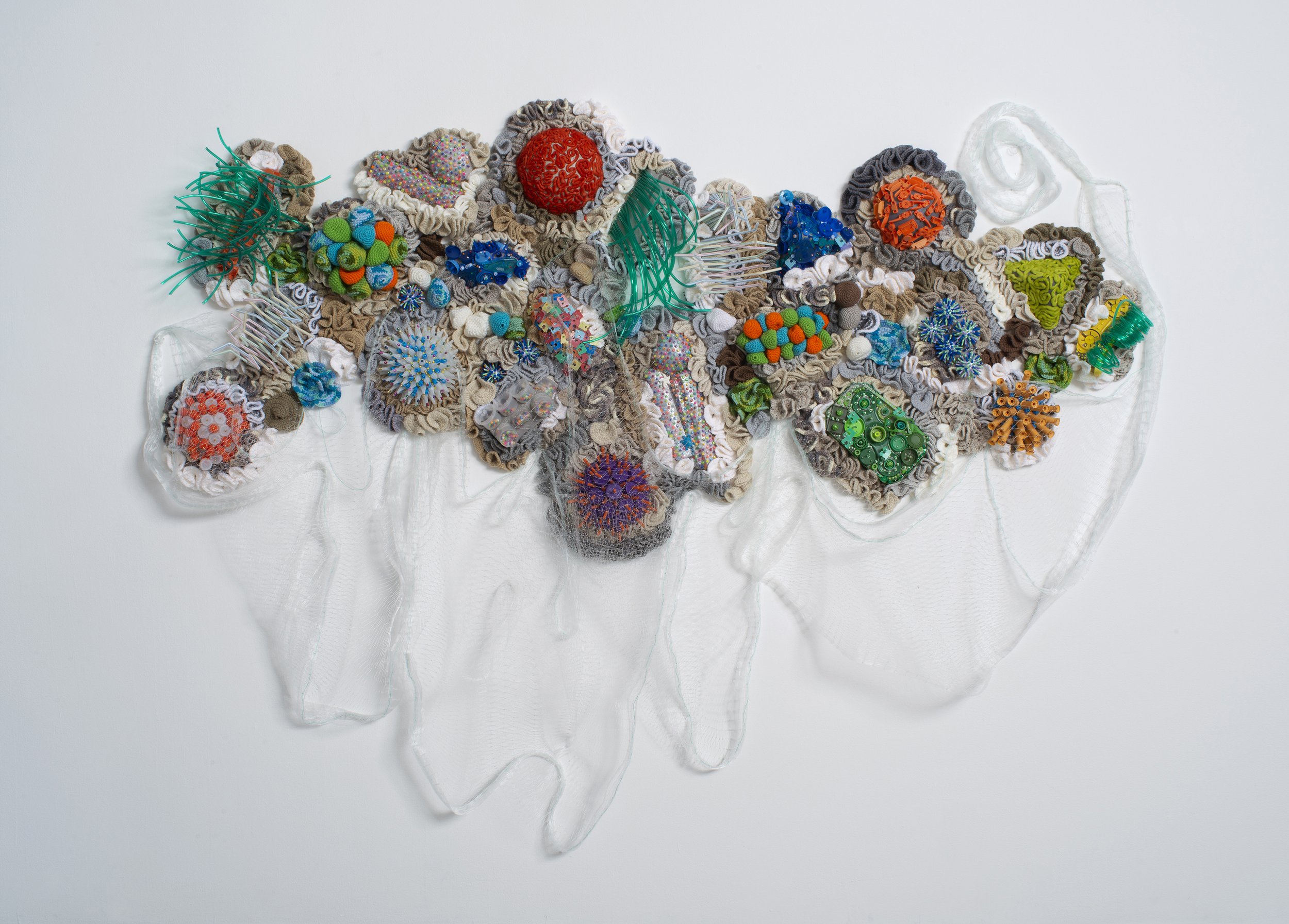 Assemblage of multi-media materials in the shape of a coral reef.
