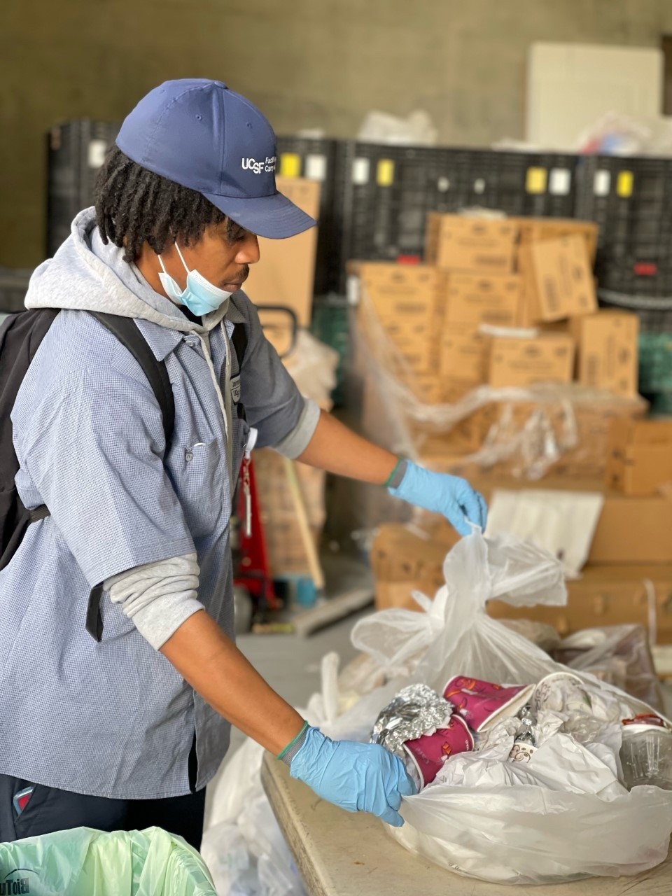 An employee sorting waste