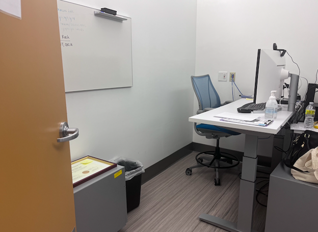 Example of a work station small landfill bin that should be removed.