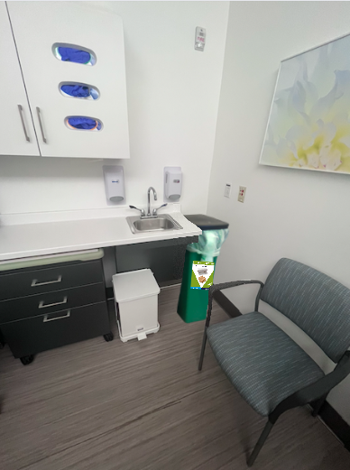 Example of a compost bin in an exam room.